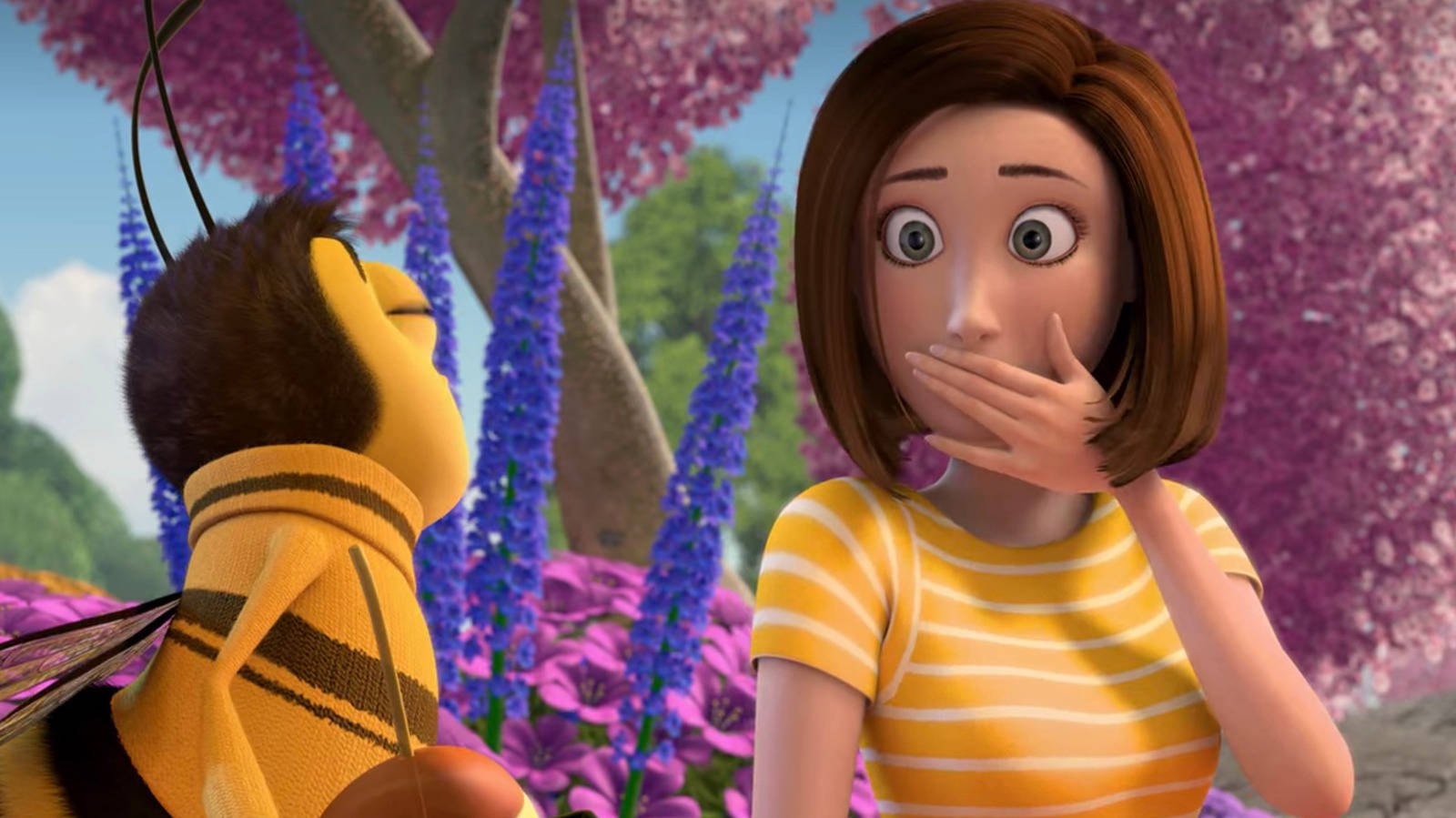 A Girl Is Holding Her Mouth Open While A Bee Is Standing Behind Her