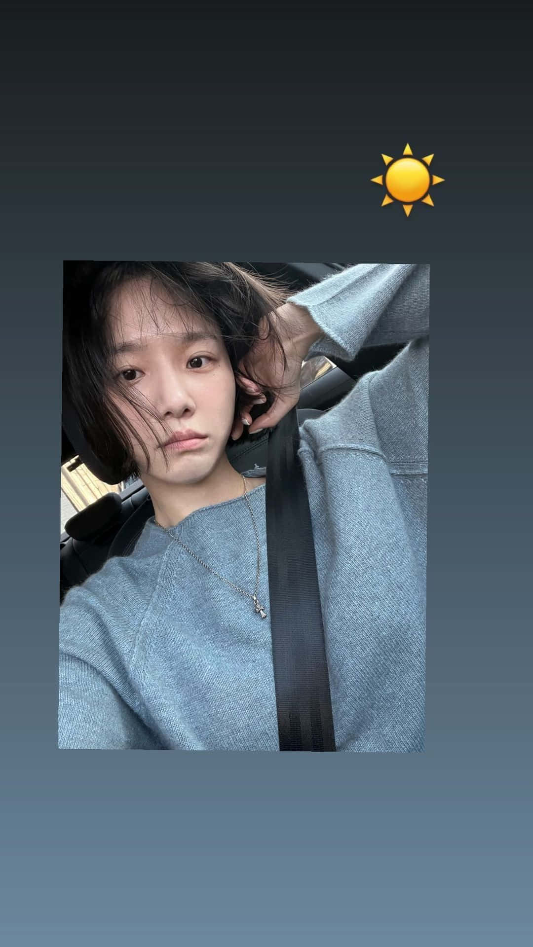 A Girl Is Sitting In A Car With Her Phone Background