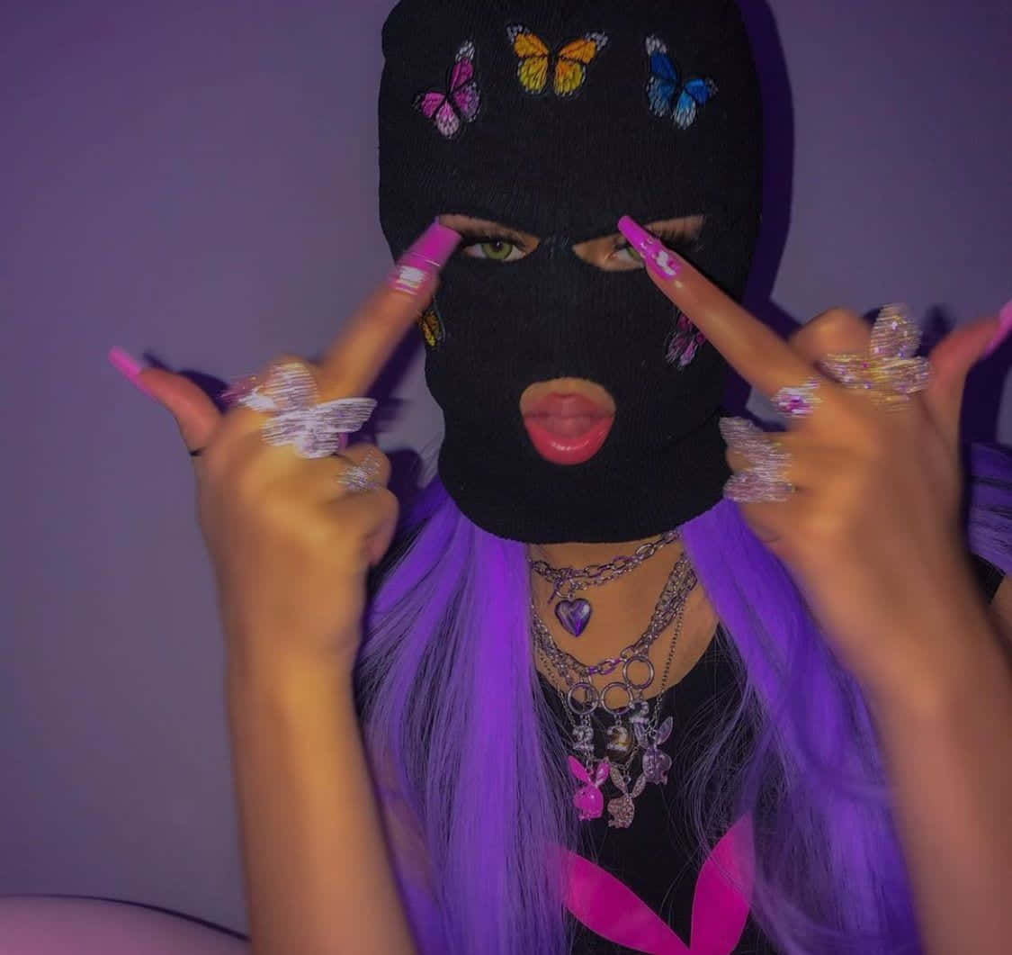 A Girl With Purple Hair And A Mask Background