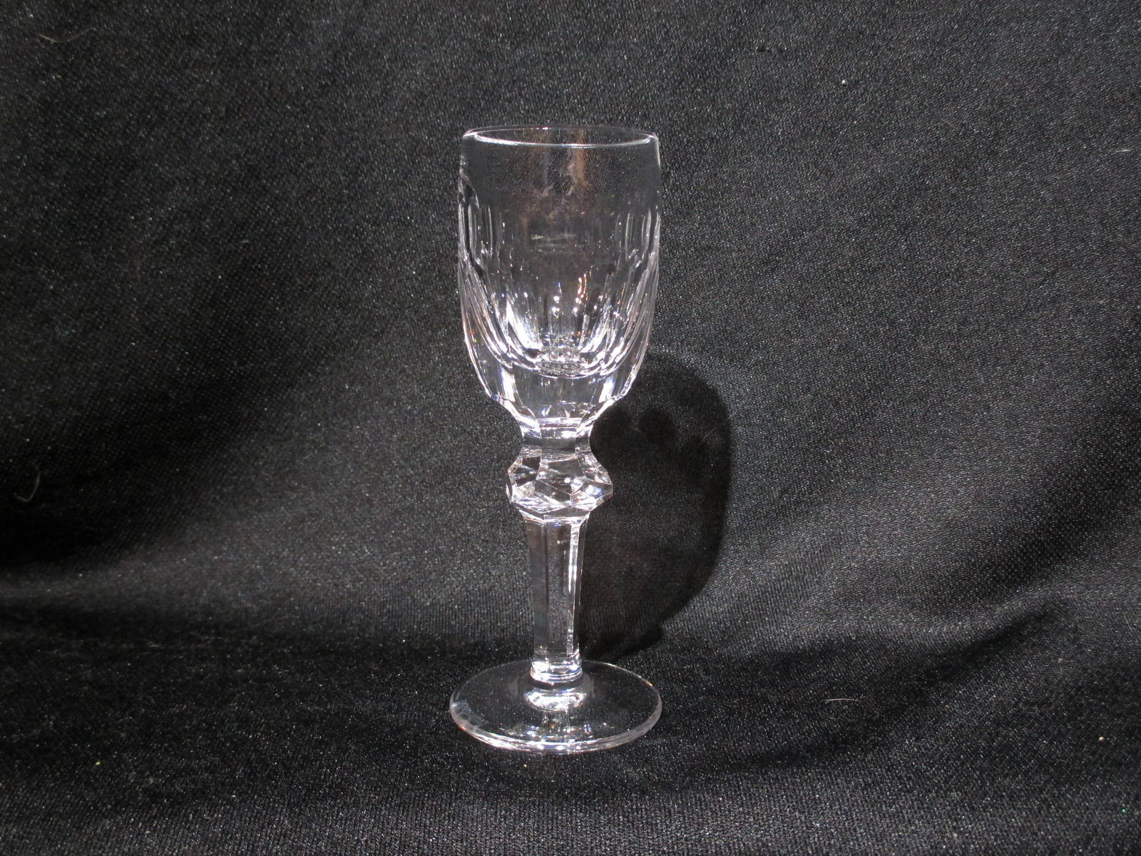 A Glass Wine Glass On A Black Background Background