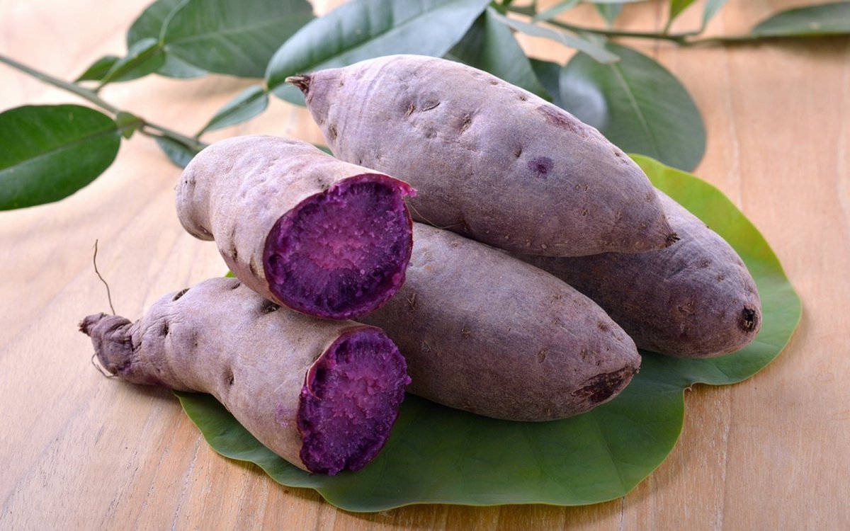 A Glimpse Of The Vibrant Filipino Purple Yam Background