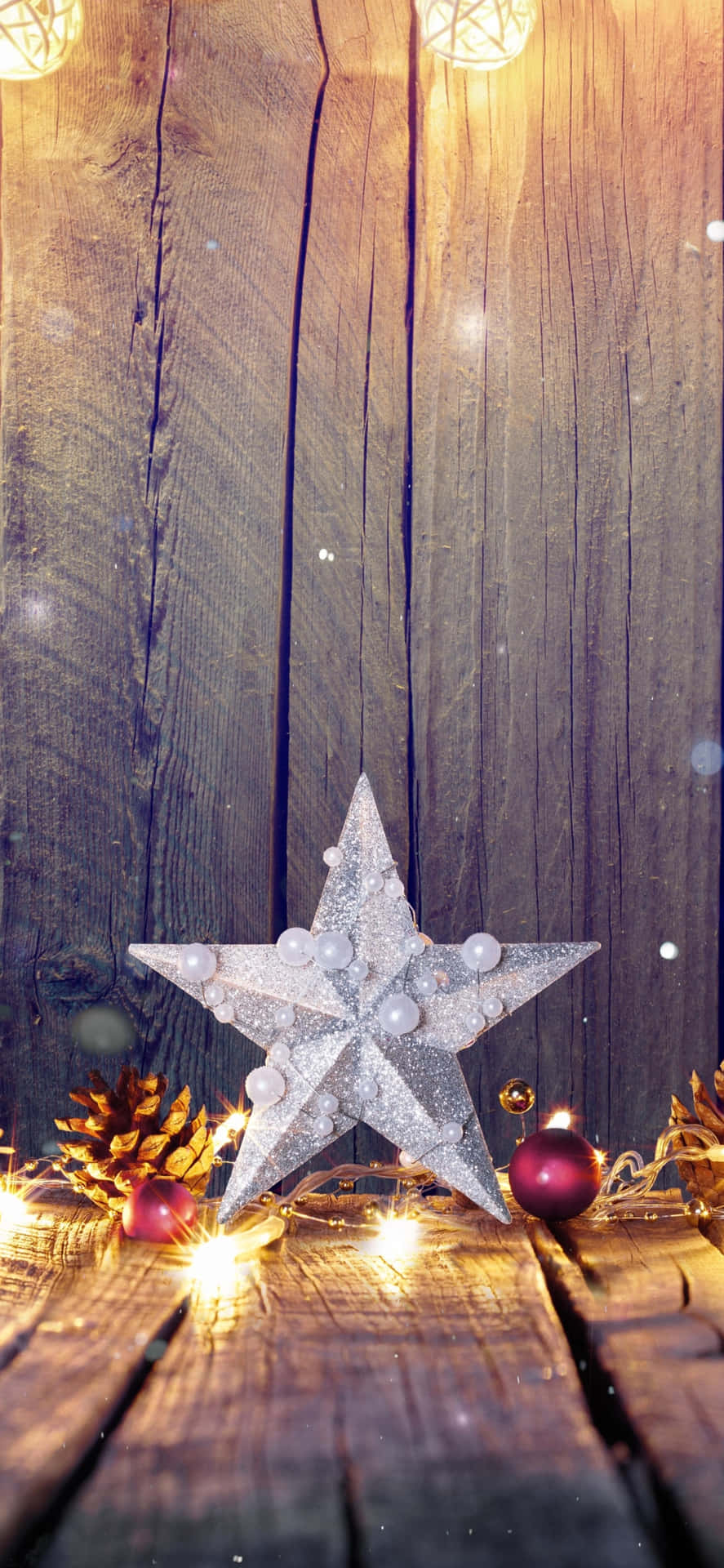 A Glistening Christmas Star Lighting The Way Background
