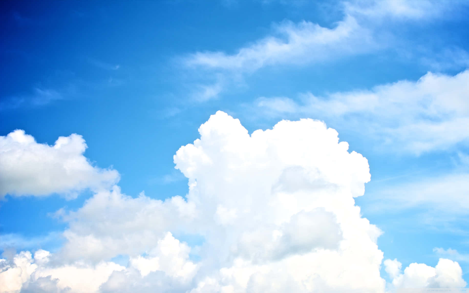 A Gloomy Blue Sky With White Clouds