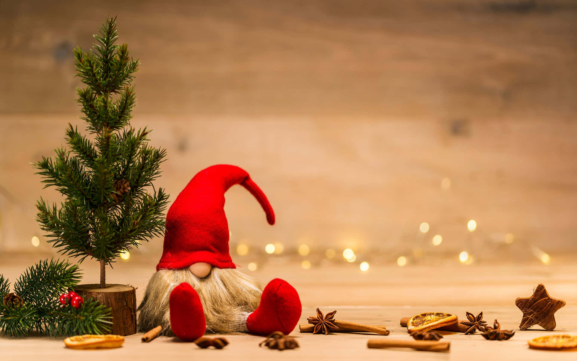 A Gnome Sitting Next To A Christmas Tree Background