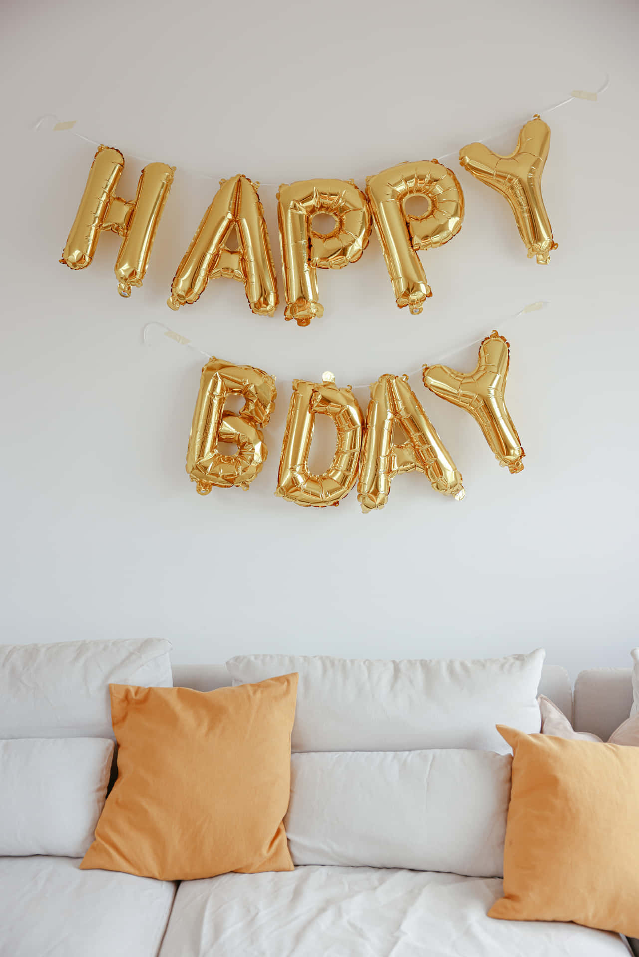 A Gold Balloon With Happy Birthday Written On It Background