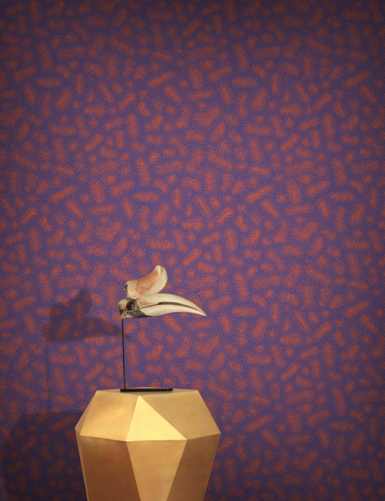 A Gold Bird Sitting On A Pedestal In Front Of A Purple Wall Background