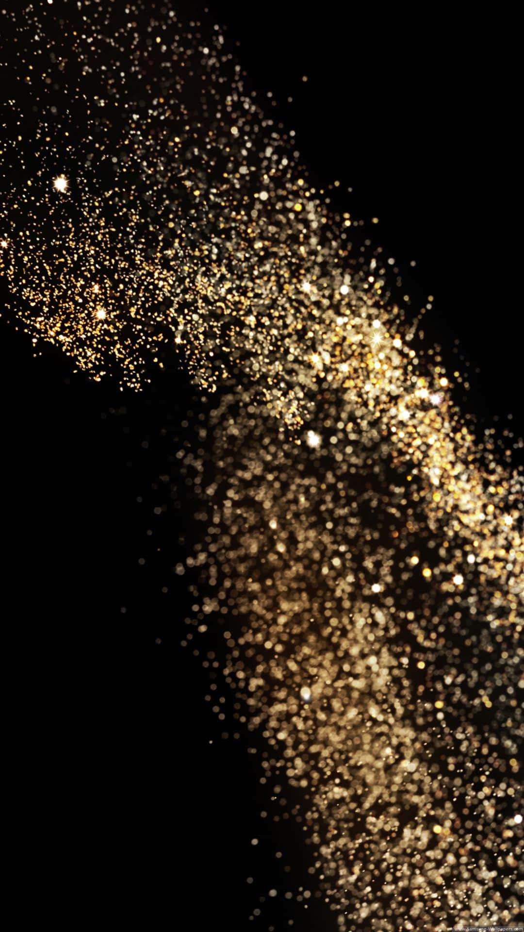 A Gold Dust Falling On A Black Background