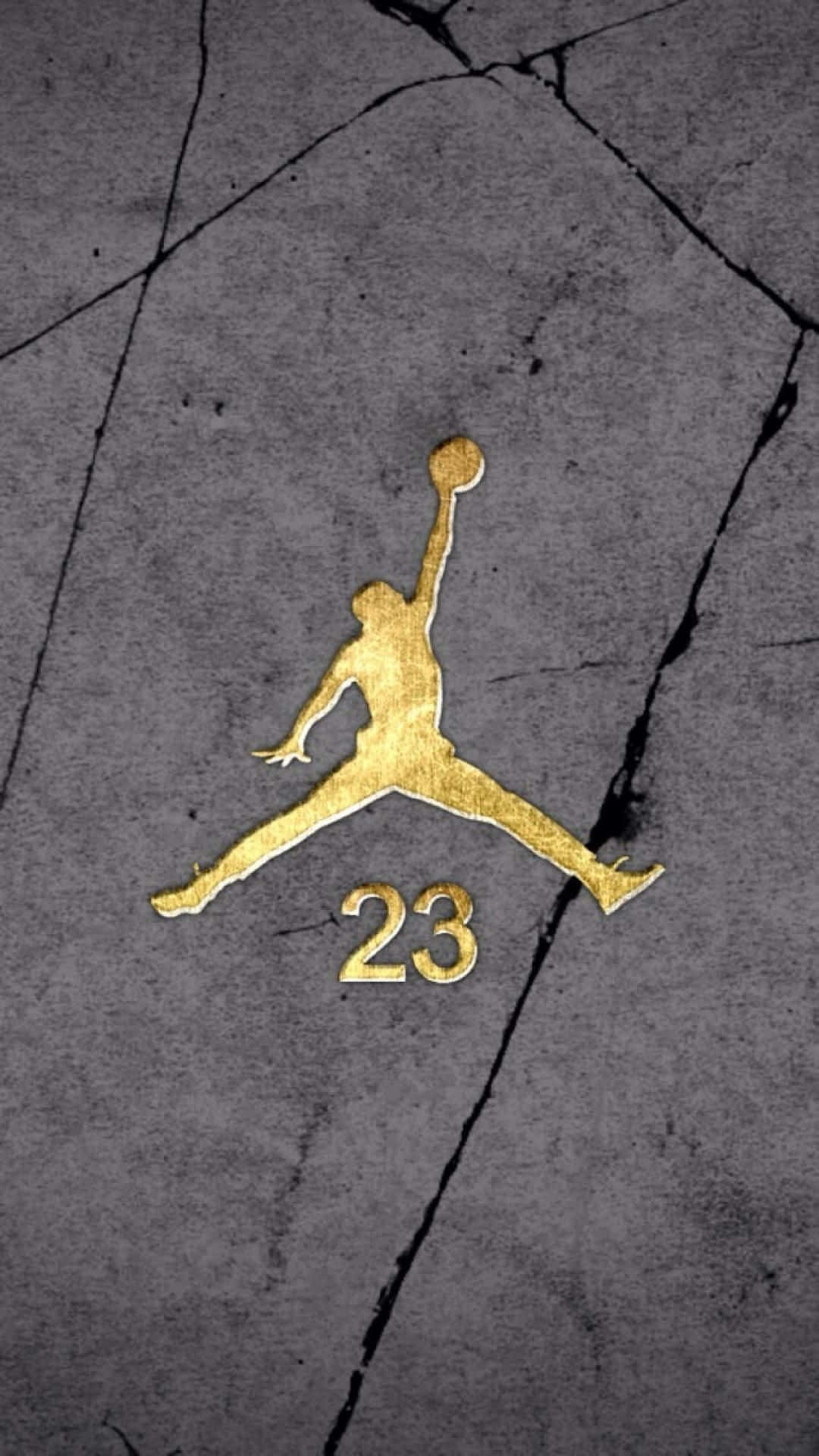 A Gold Jordan Logo Is On The Ground