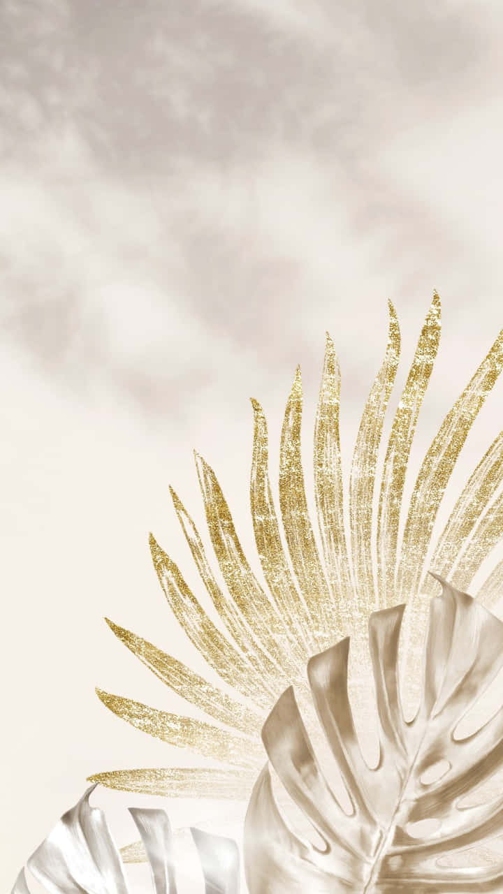 A Gold Leaf With A Cloudy Sky Background