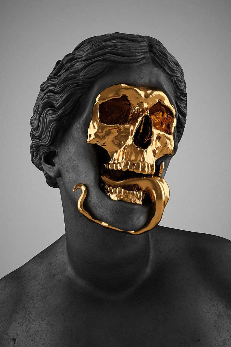 A Gold Skull With A Snake On It