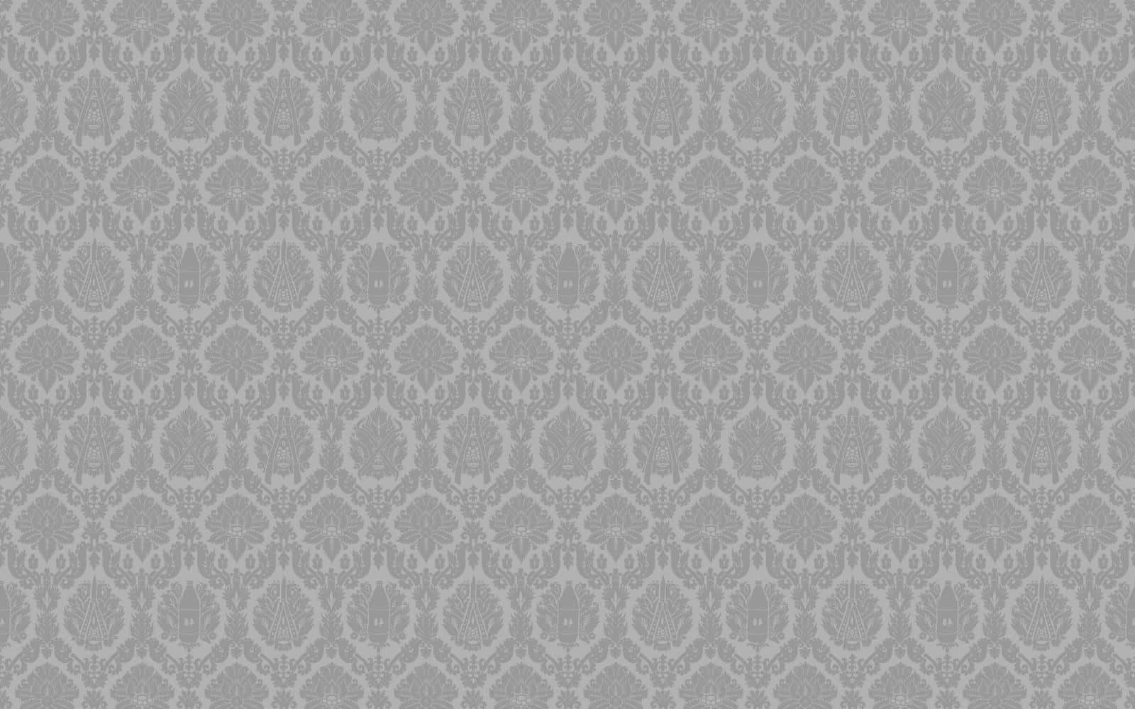 A Gray Wallpaper With A Geometric Pattern