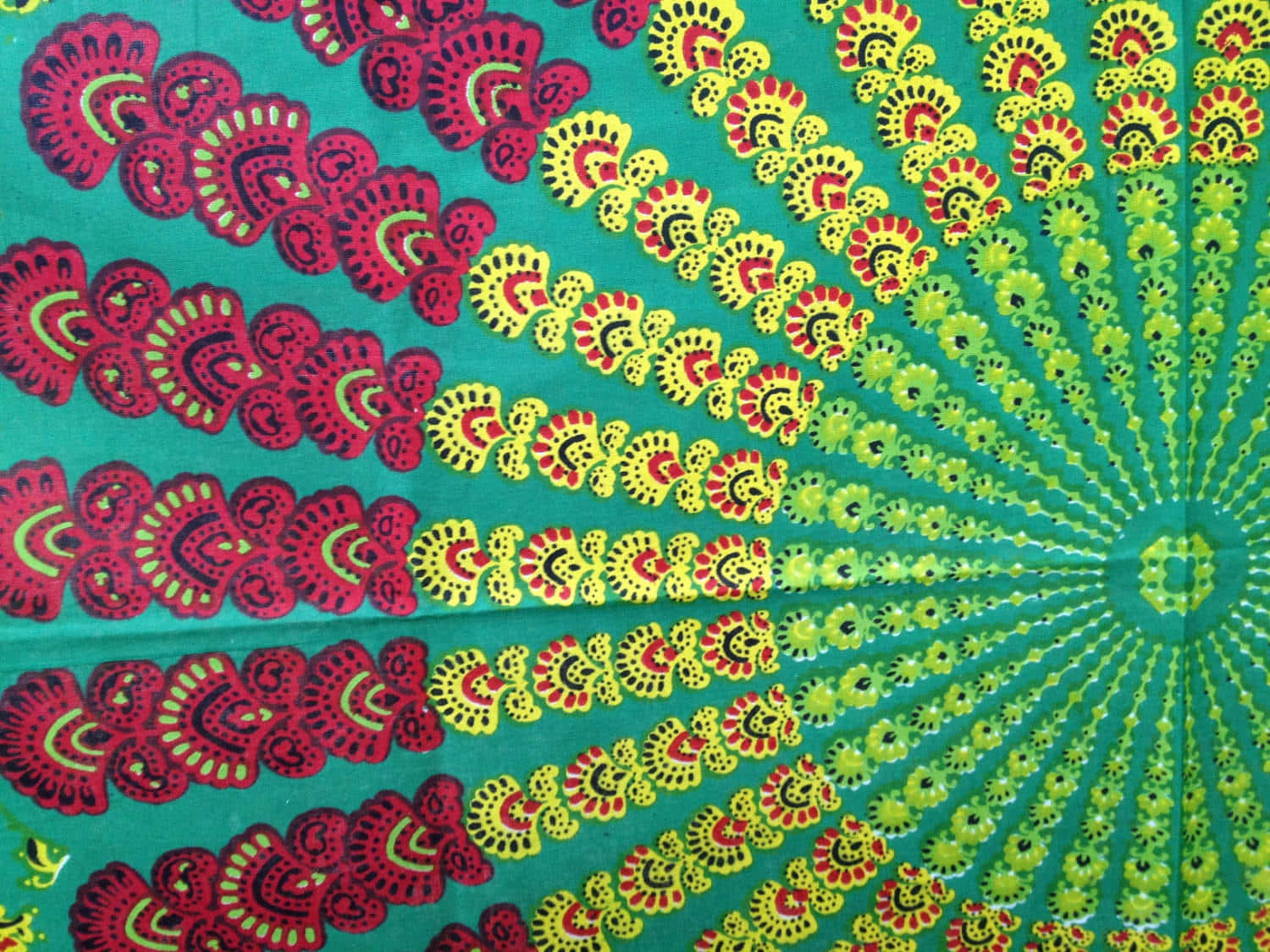 A Green And Yellow Tapestry With A Colorful Design Background