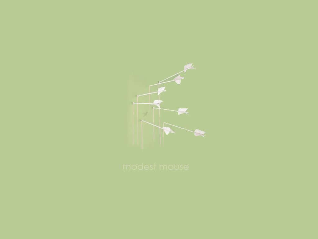 A Green Background With A White Logo For The Model House Background