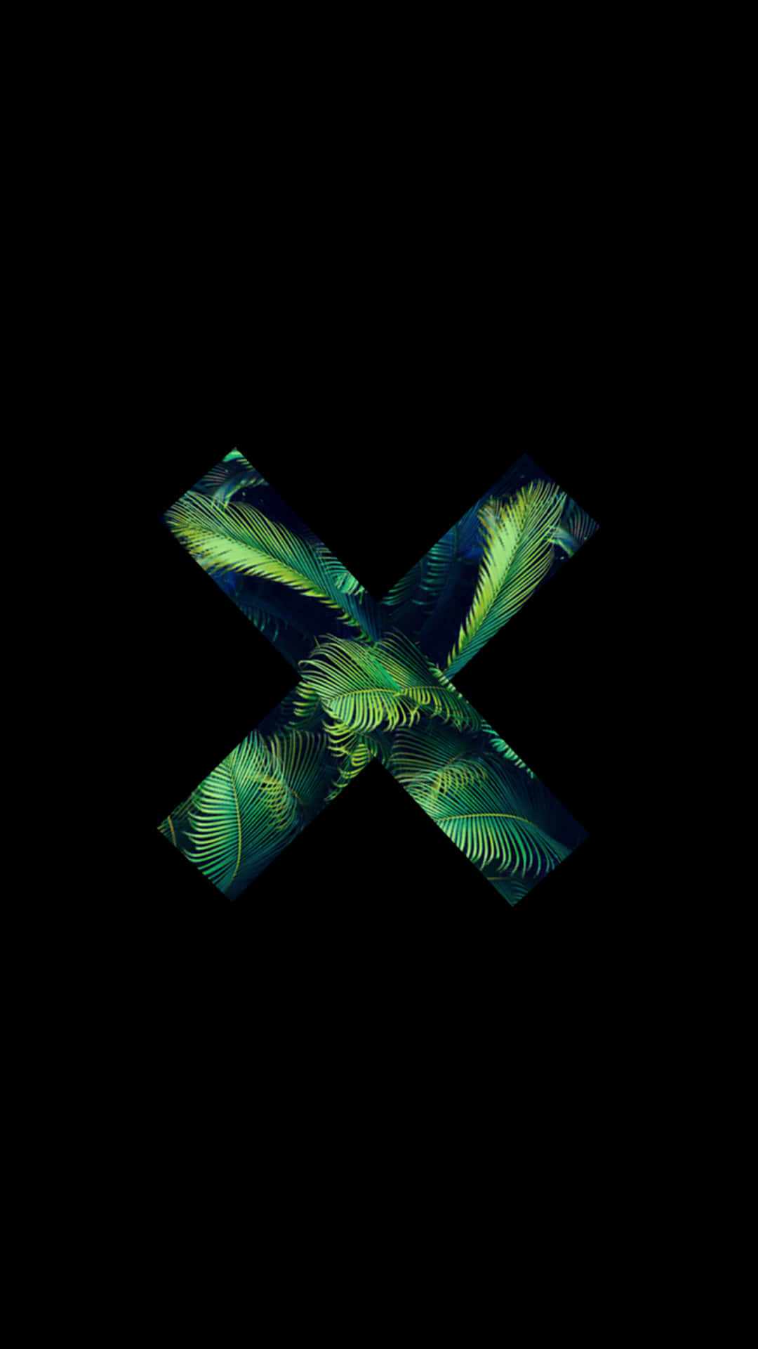 A Green Leaf With A Black Background Background