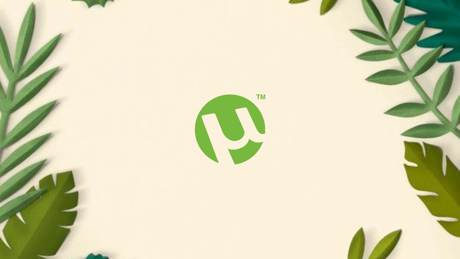 A Green Logo With Leaves Surrounding It Background