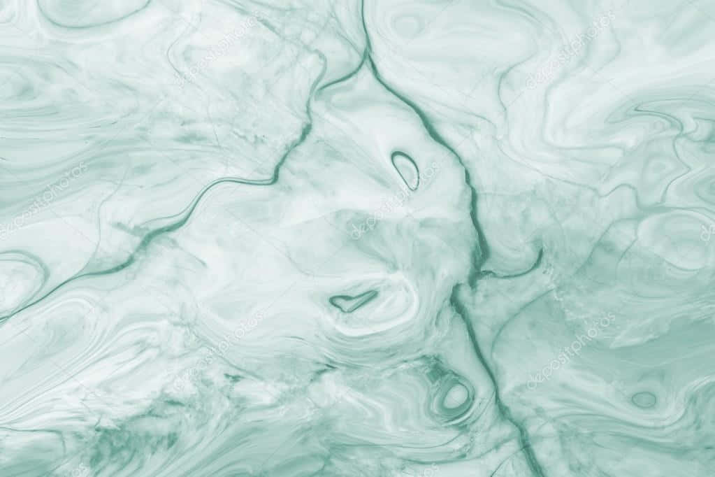 A Green Marble Background With A Lot Of Swirls Background