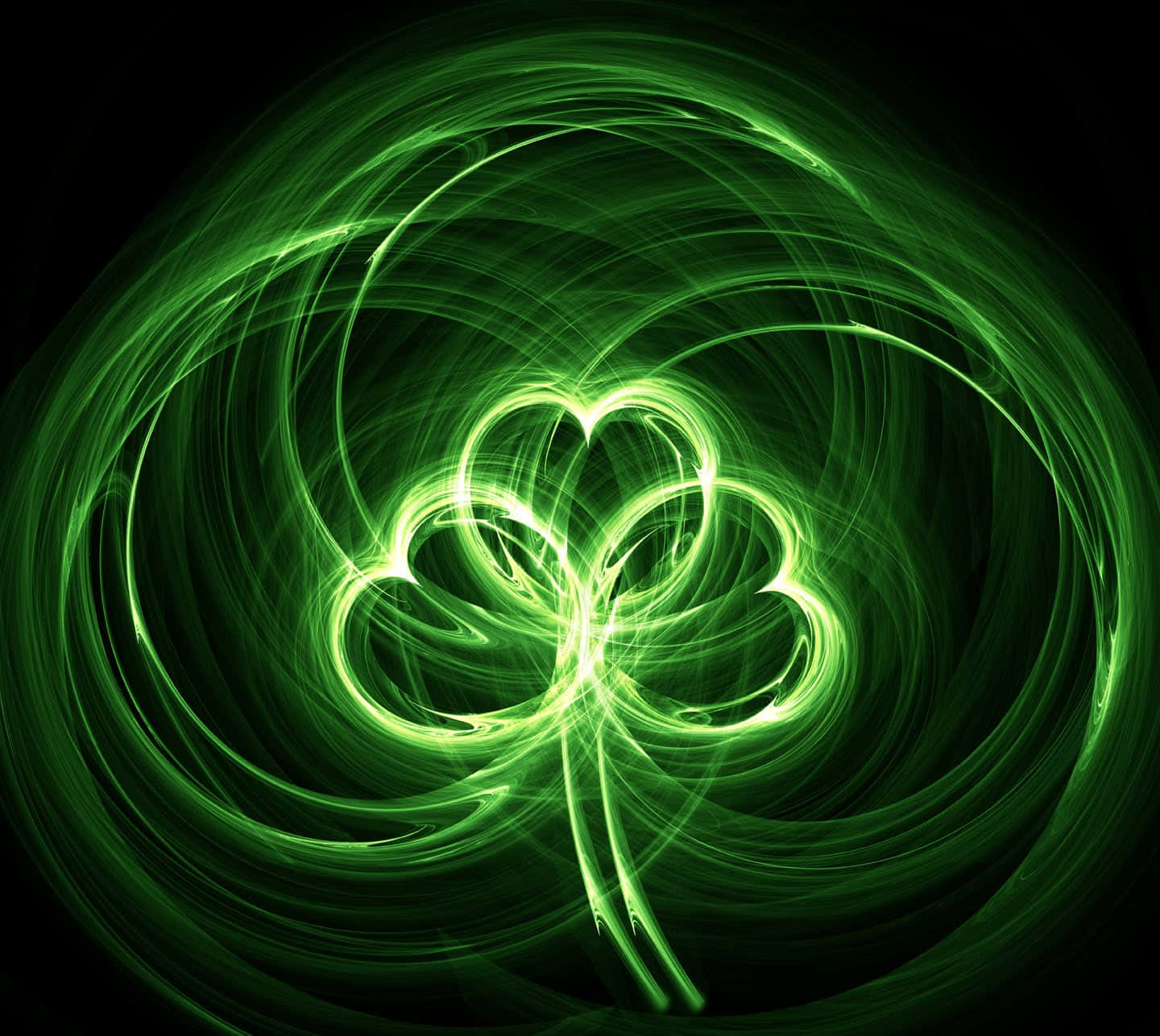 A Green Shamrock On A Black Background Background