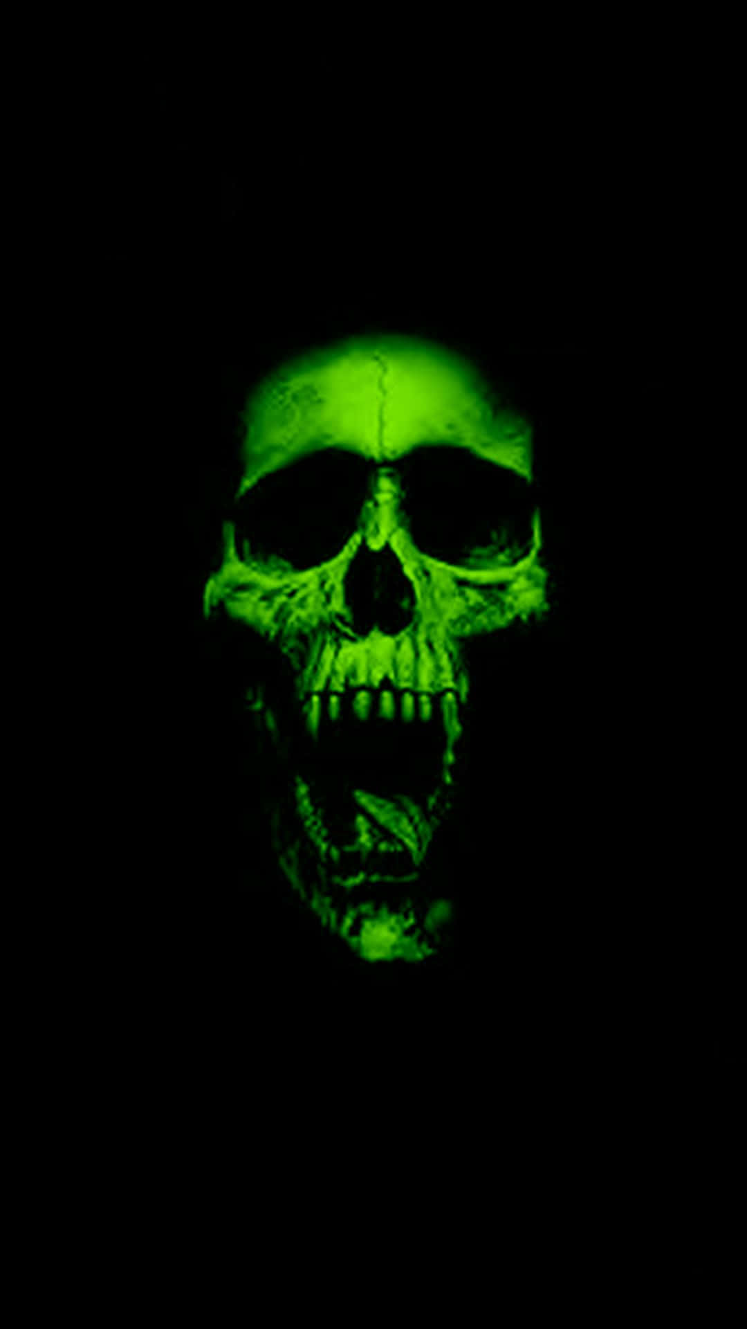 A Green Skull With Teeth On A Black Background Background