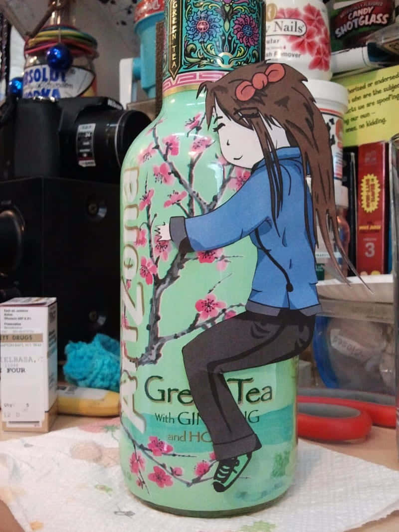 A Green Tea Bottle With A Girl Sitting On It Background