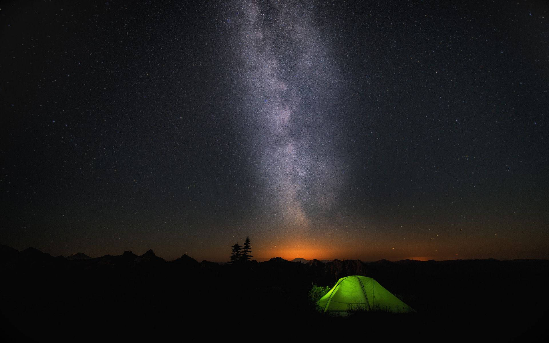A Green Tent Under The Milky Background