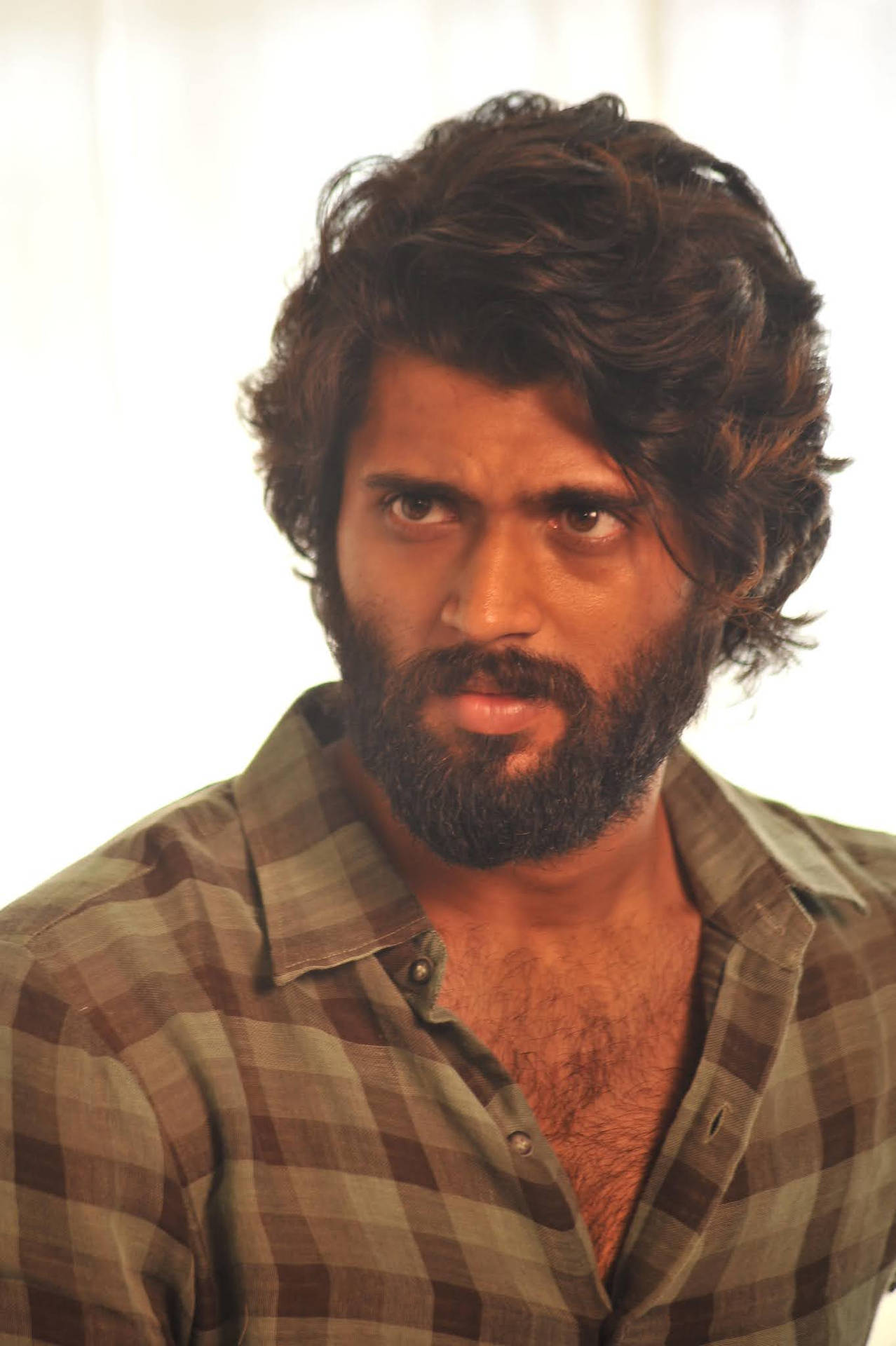 A Gritty Shot Of Arjun Reddy In Checkered Polo