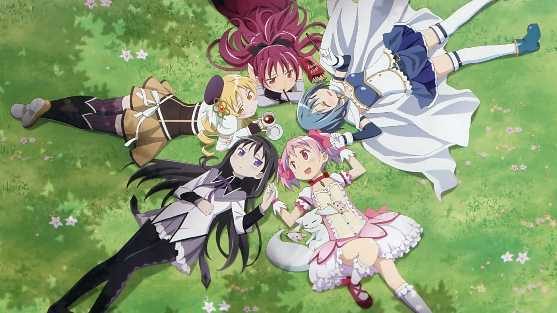 A Group Of Anime Girls Laying On The Grass