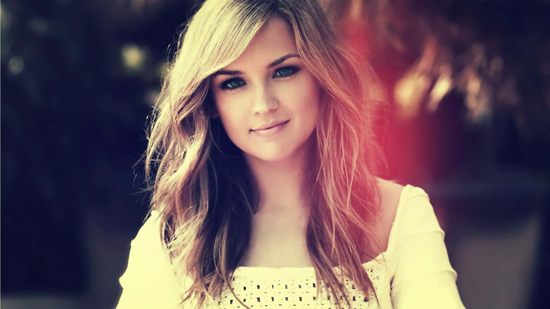 A Group Of Beautiful Girls Laughing And Having Fun Outdoors