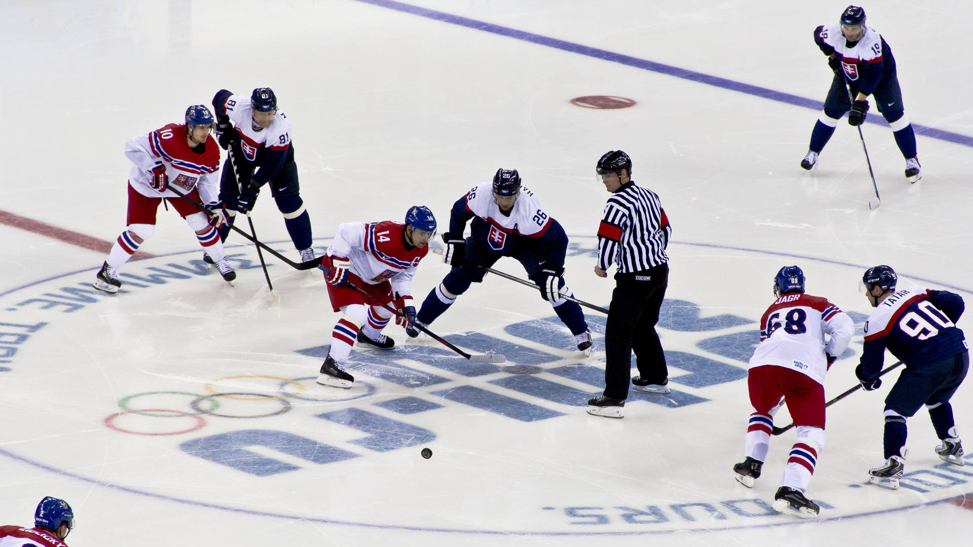 A Group Of Hockey Players On The Ice Background