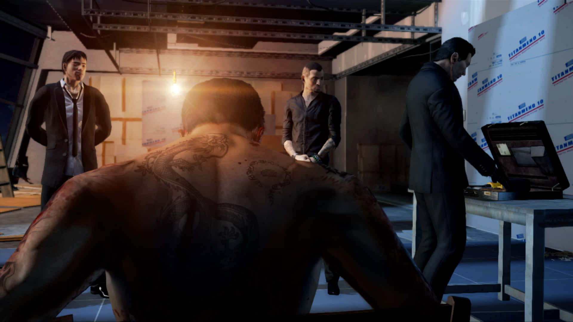 A Group Of Men In A Room With A Computer Background