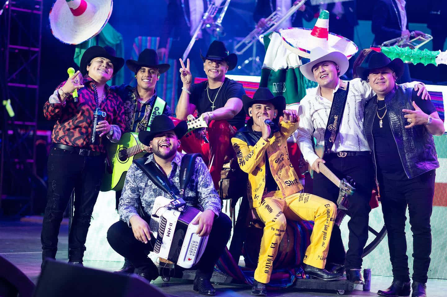 A Group Of Men In Hats And Costumes Posing For A Photo Background