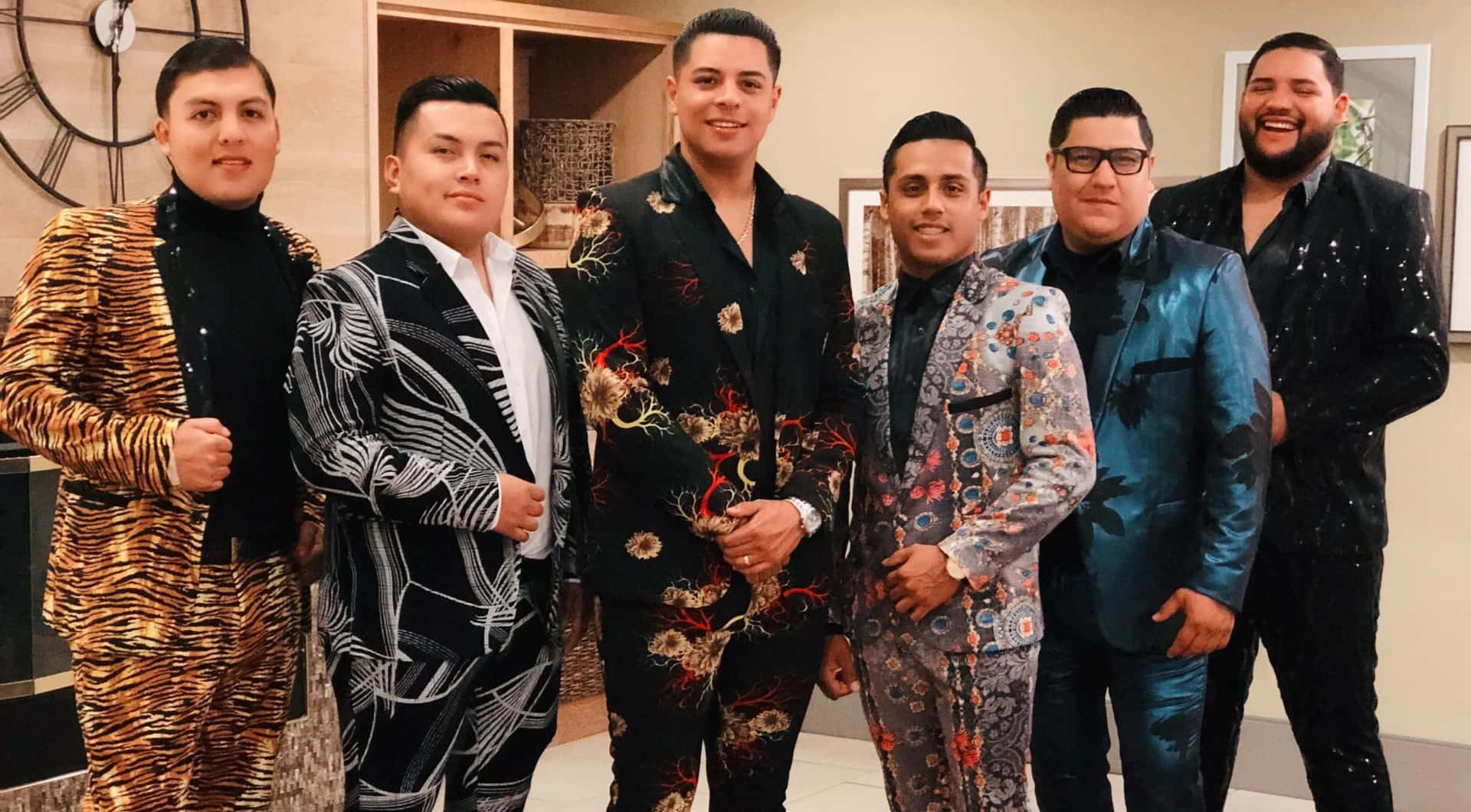 A Group Of Men In Suits Posing For A Photo Background