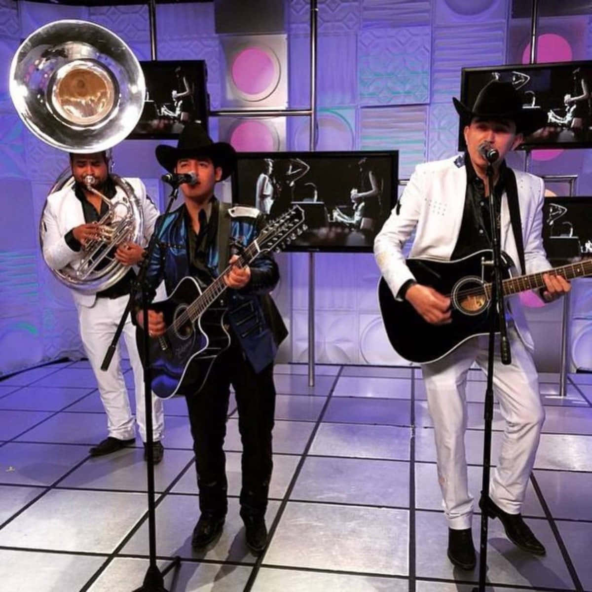 A Group Of Men In White Suits Playing Instruments Background