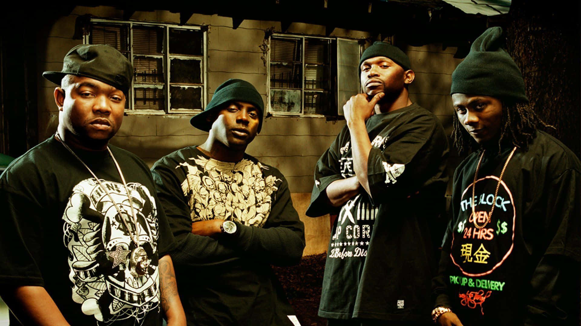 A Group Of Men Standing In Front Of A Building Background