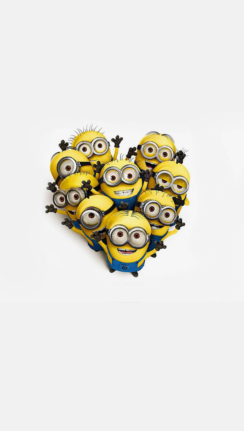 A Group Of Minions Forming A Heart Shape Background