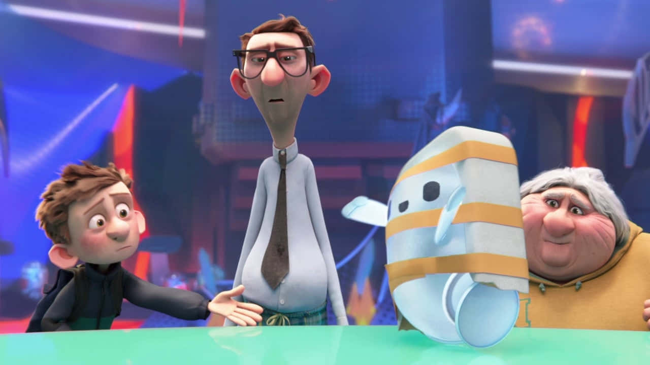 A Group Of People Are Standing Around A Table