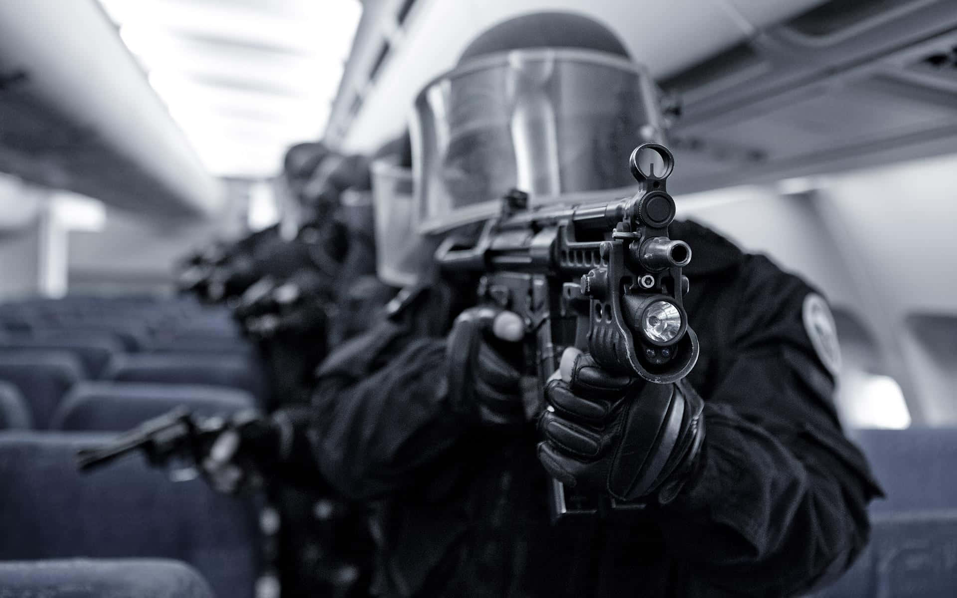 A Group Of Police Officers On An Airplane Background