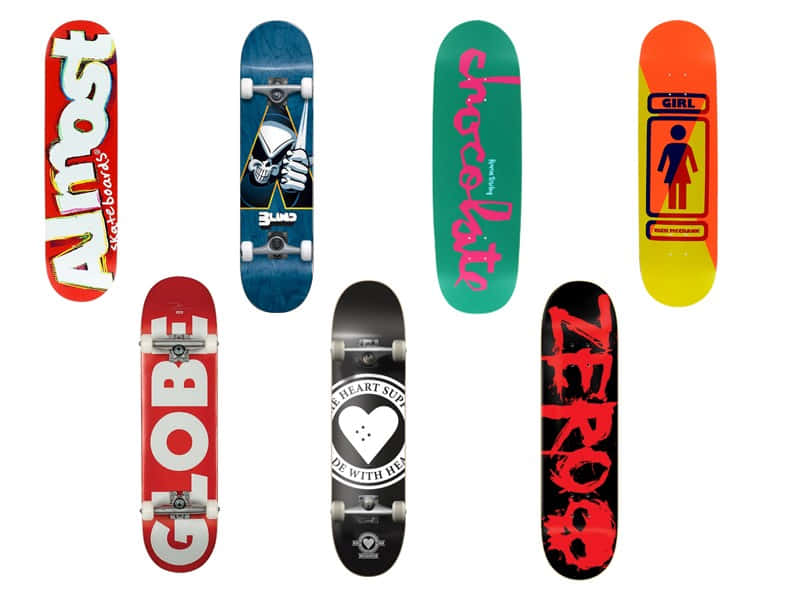 A Group Of Skateboards With Different Designs On Them Background