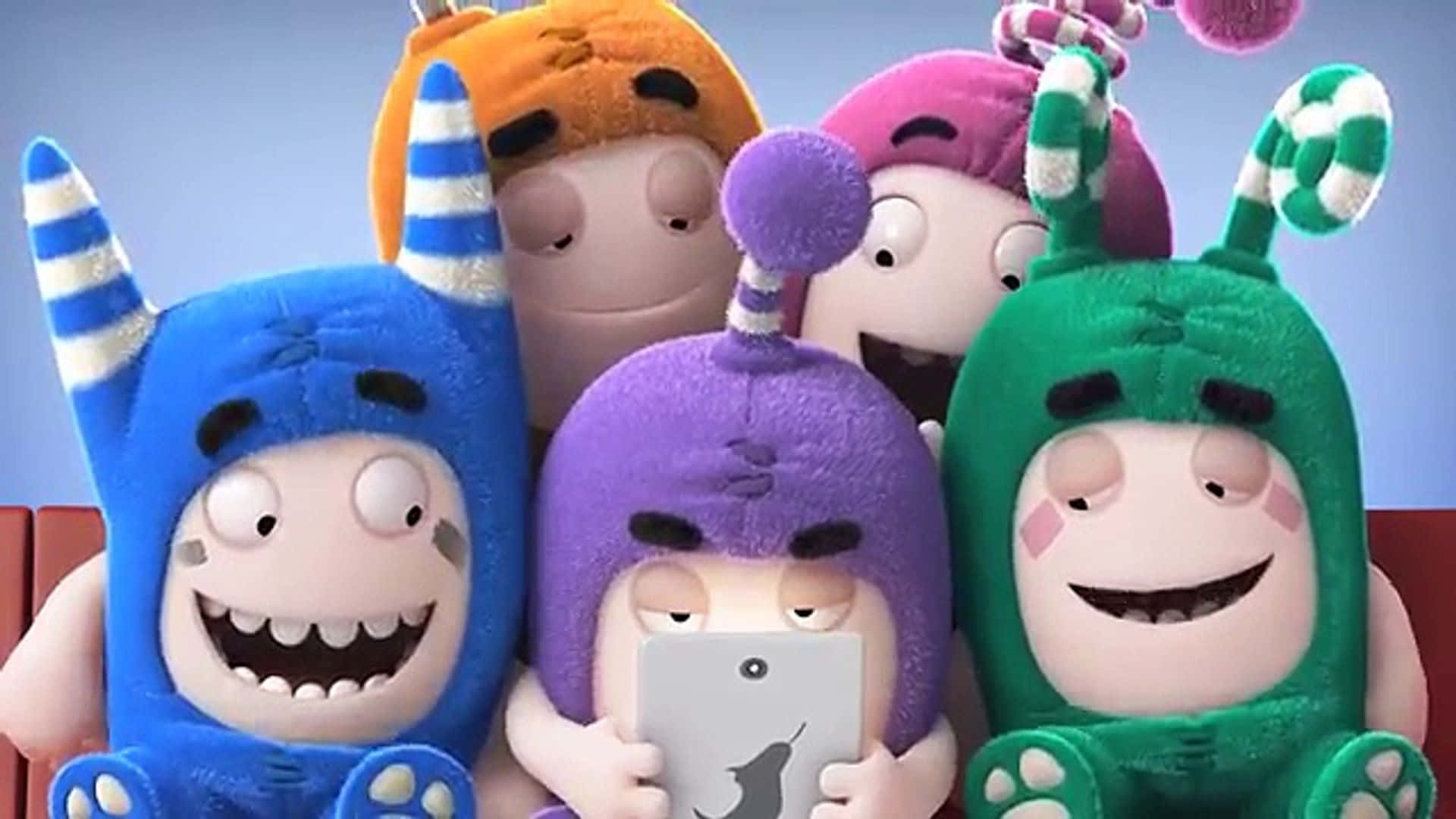 A Group Of Stuffed Animals Are Sitting On A Couch Background