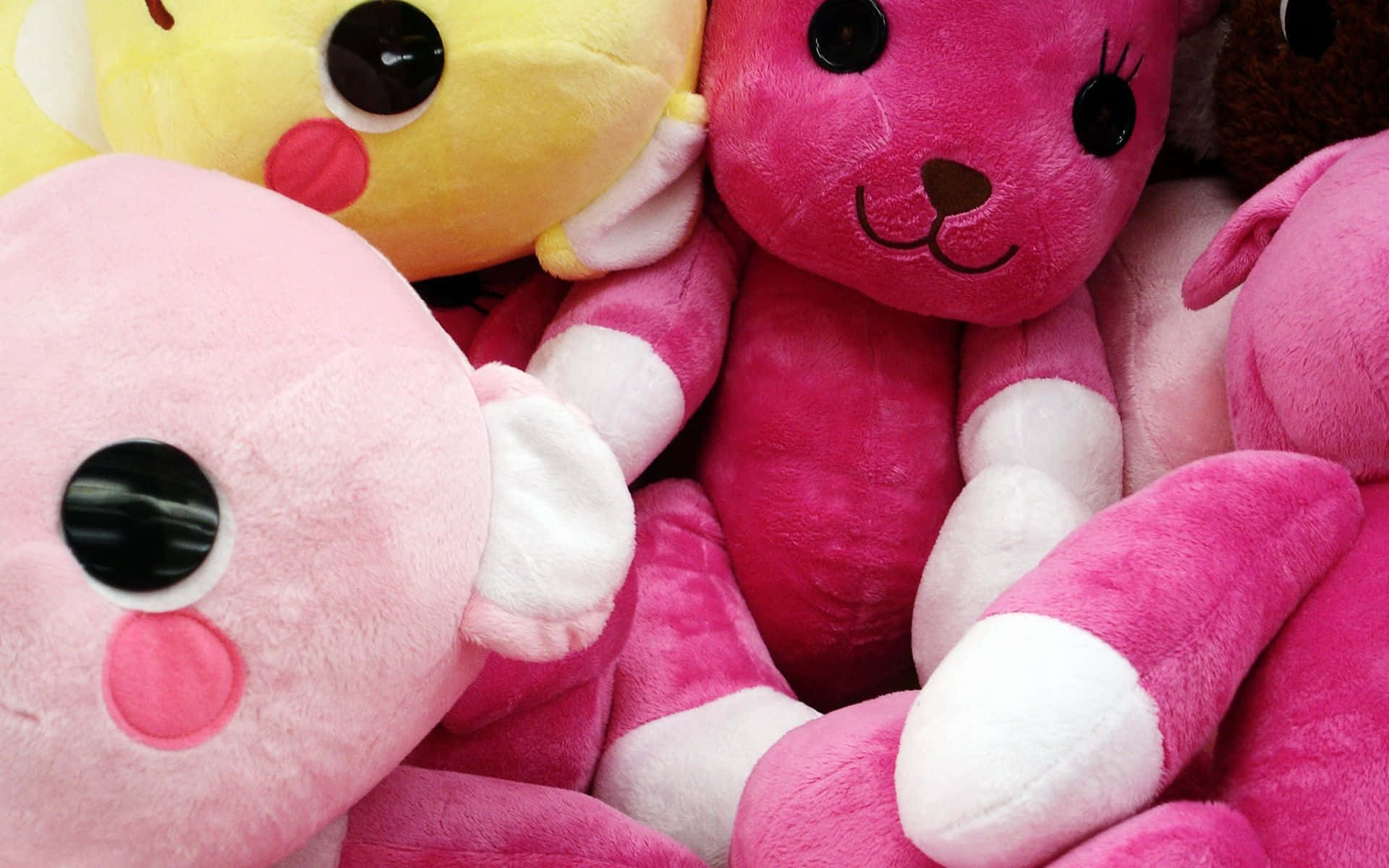 A Group Of Stuffed Animals Background