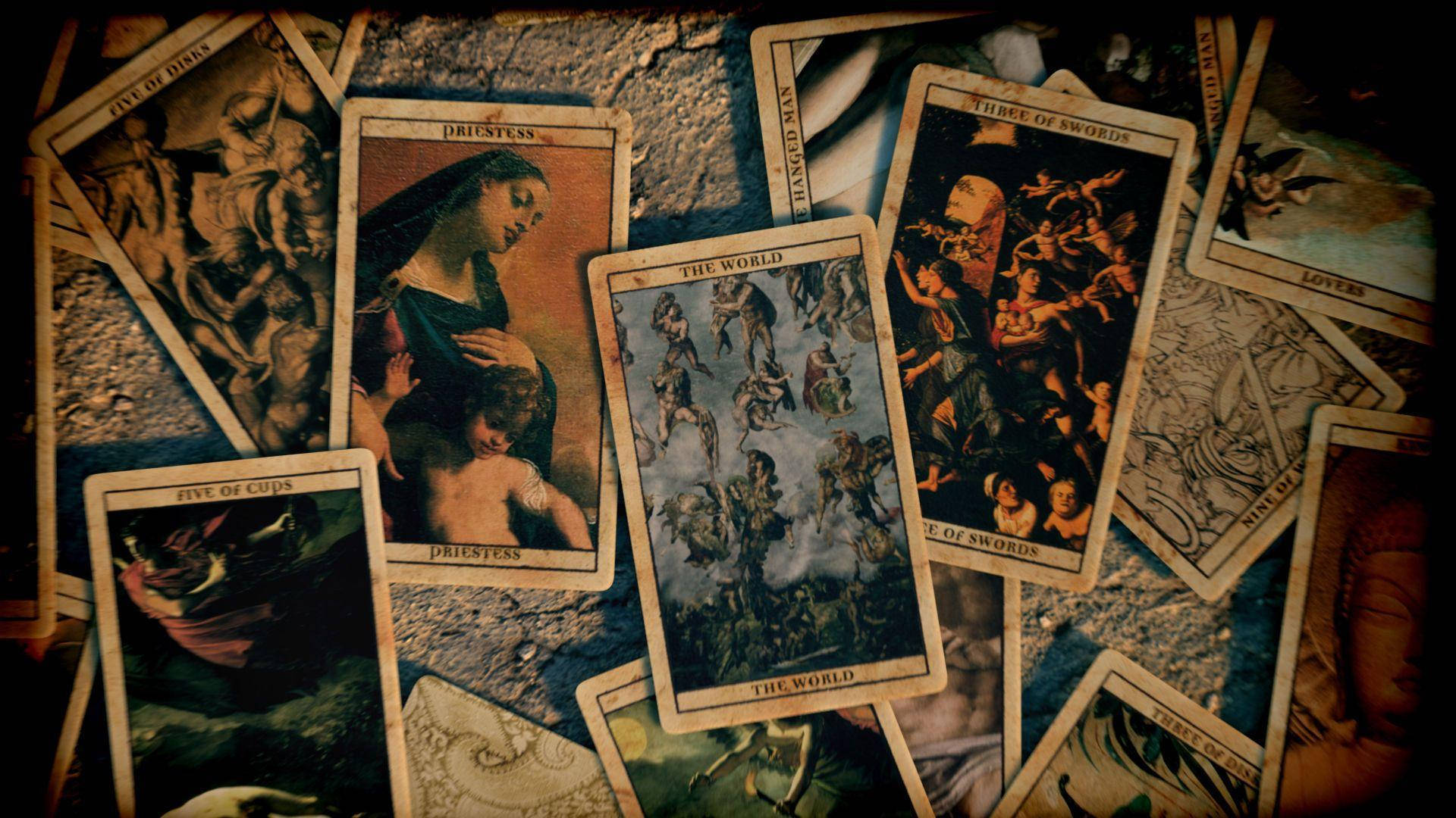 A Group Of Tarot Cards Are Arranged On A Table Background