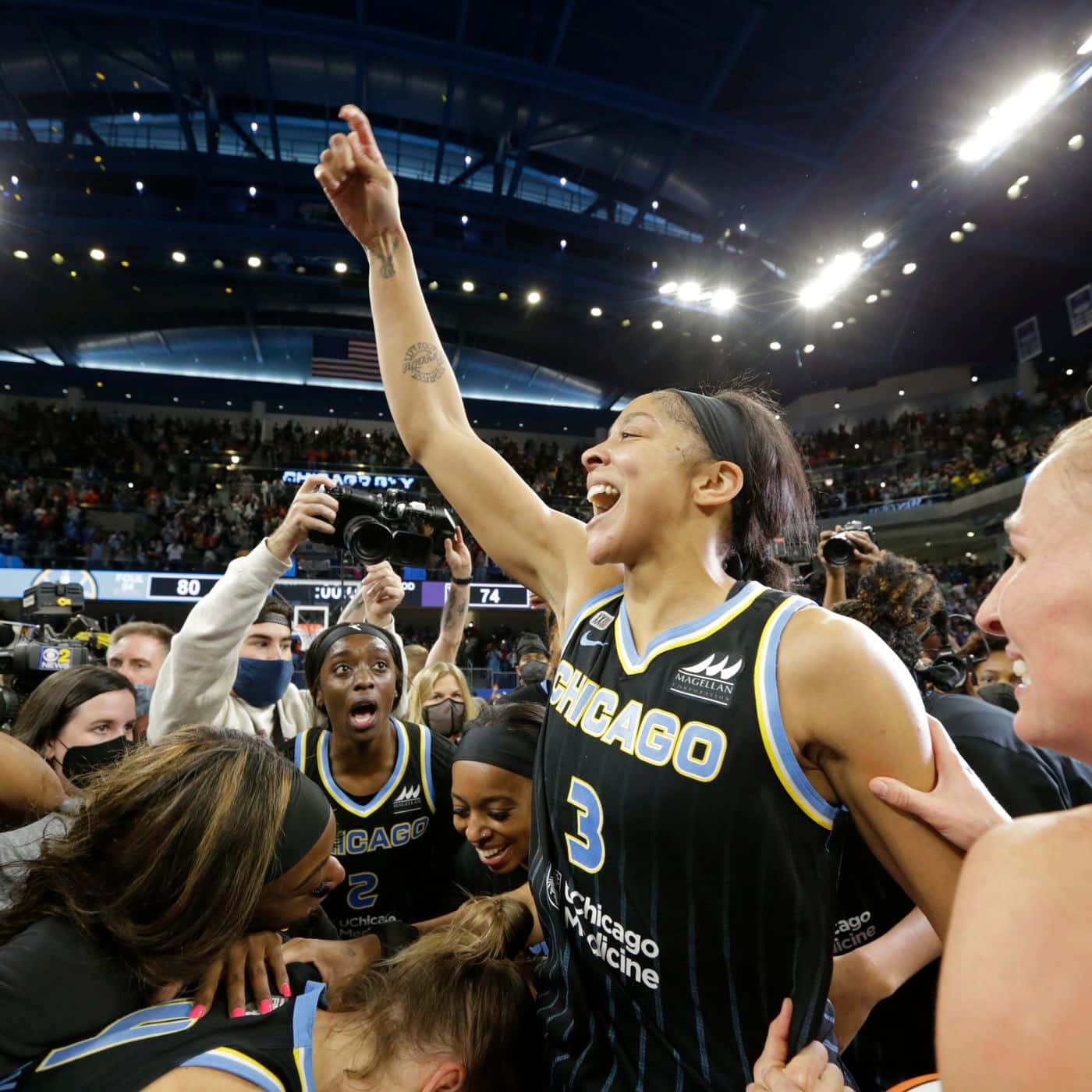 A Group Of Women Celebrating After Winning A Basketball Game Background