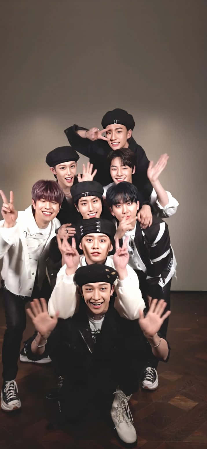 A Group Of Young Men Posing For A Photo Background