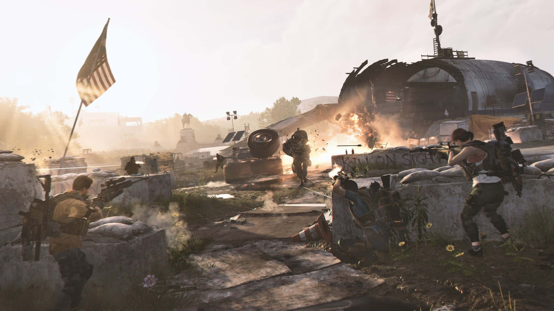 A Gunner From The Division 2 Game Shooting His Weapon Amidst A Destroyed Cityscape. Background