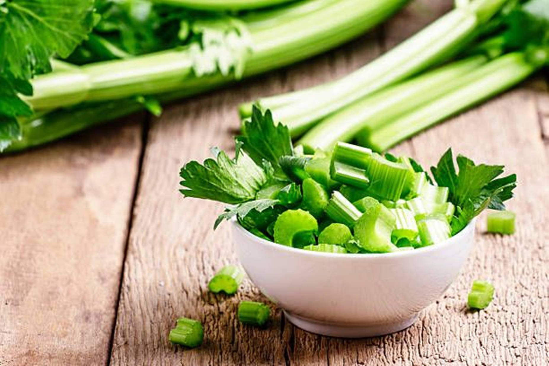 A Healthy Serving Of Fresh Celery In A Bowl Background