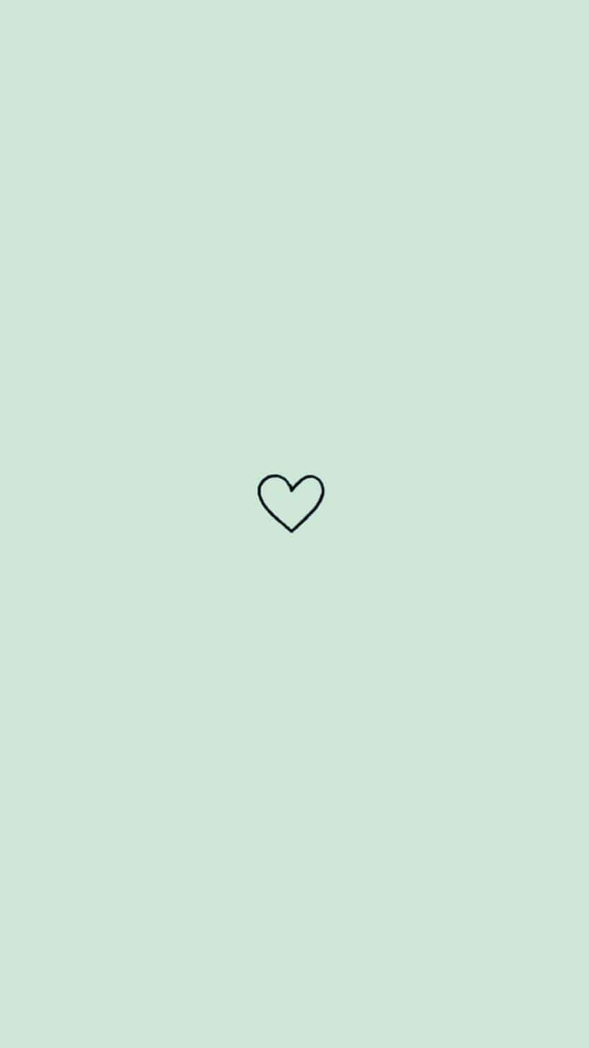 A Heart Icon On A Green Background
