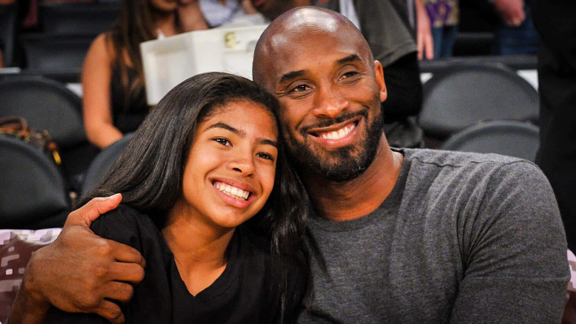 A Heartwarming Bond: Kobe And Gigi Bryant's Basketball Journey Background