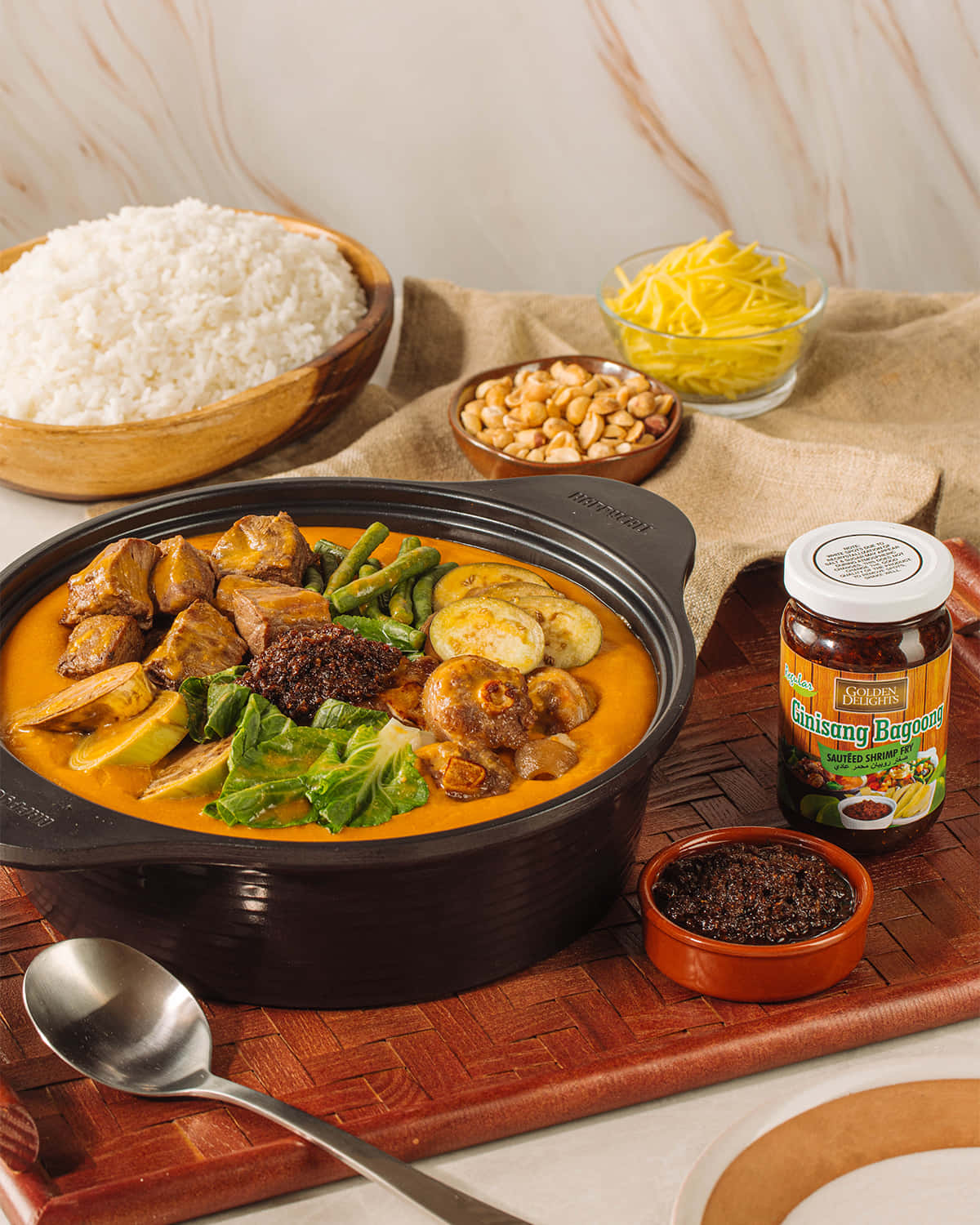 A Hearty Serving Of Traditional Kare-kare With Rice Background