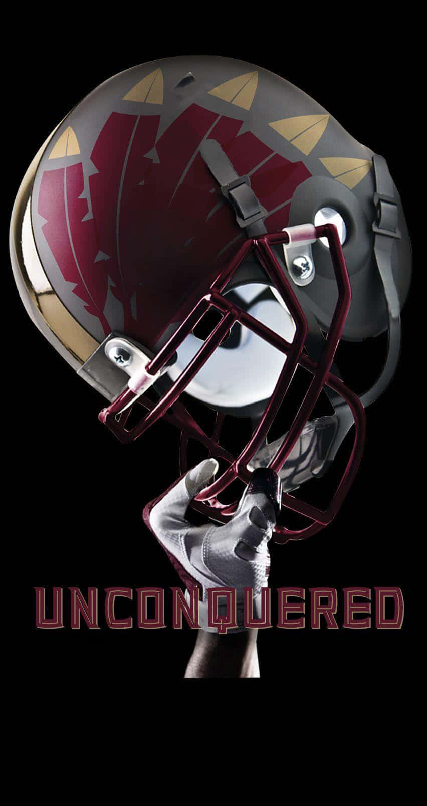 A Helmet With The Word Unconquered On It Background