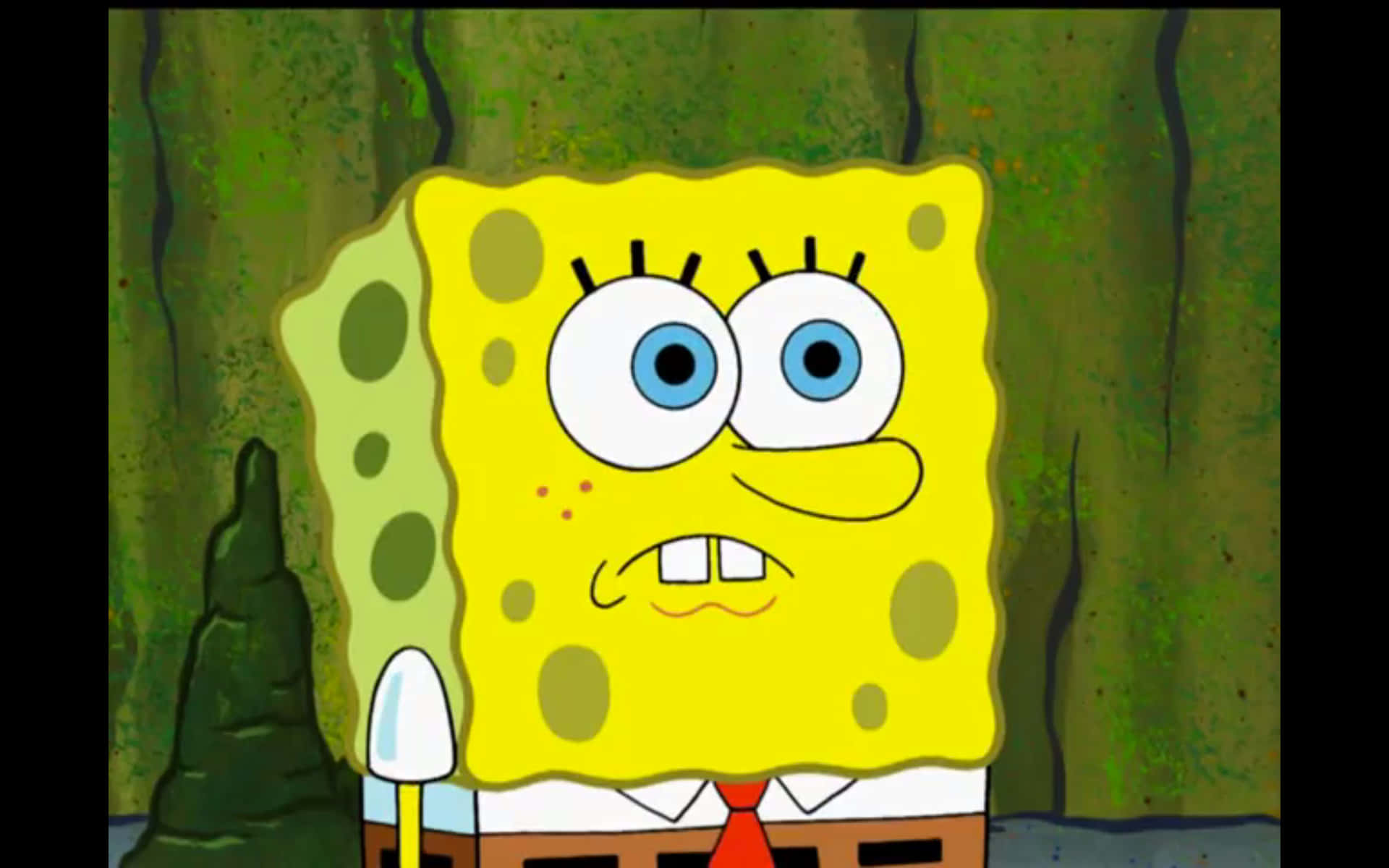 A Hilarious And Happy Spongebob Face Background