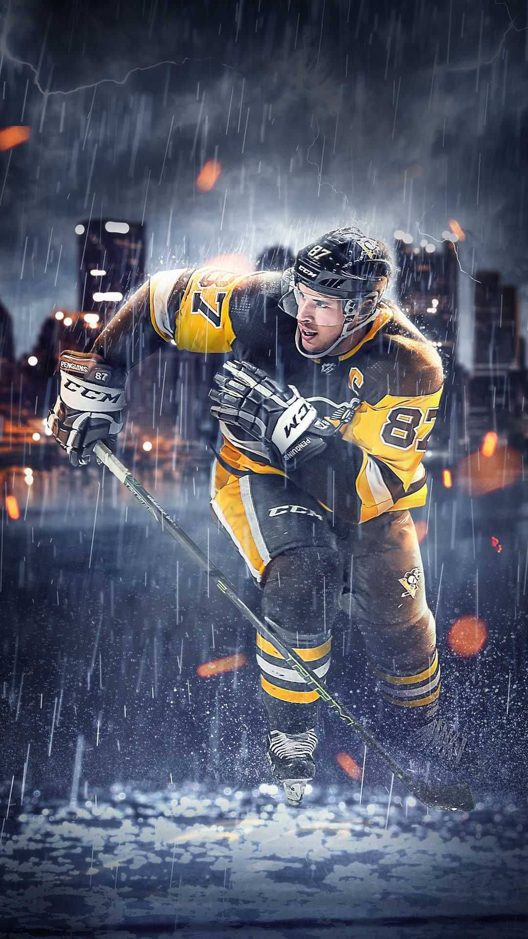 A Hockey Player Is Playing In The Rain Background